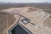 Figure 1 - Castle Mountain Phase 1 heap leach pad (background) and processing facility (foreground) (CNW Group|Equinox Gold Corp.)