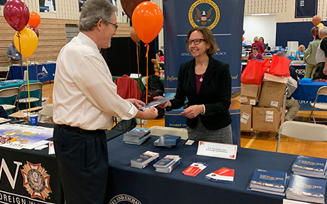 Cindy Hoekstra of the Philadelphia Regional Office speaks with an attendee at the 2019 Senior Citizen Expo